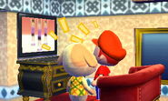 A player with Goldie laughing at Aerobics (Taken from Happy Home Designer)