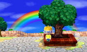 A player sitting by the town tree