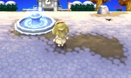 Fontaine ACNL.png (134 kio) Une joueuse à coté de la fontaine dans New Leaf