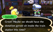 Isabelle telling the mayor about placing the donation gyroid in the train station