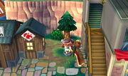 The player is able to sit on the gray gardening pot before the shop begins to be built.