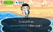 Le joueur ayant pêché un Poisson-ballon lors d'une excursion de pêche