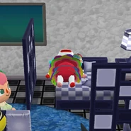 Pietro allongé sur un lit Moderne dans Pocket Camp