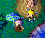 A player next to Ursala, who fell in a pitfall.