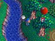 18 red balloon tree.png (546 KB) A red balloon landing in a tree in Animal Forest e+.