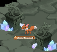 Fox statues flanking the Foxes Only gate.