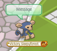 A player with the Animal Jam Guide badge and message tint