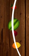 Four fruits sliced at once.