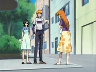 Orihime meets Ichigo and Rukia in street after hurting her leg.