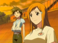 Orihime sits with Tatsuki before going to .