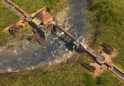 A water pump building filling a canal irrigation system.