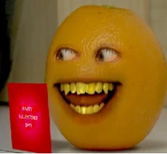 Orange reading his Valentine card from Midget Apple