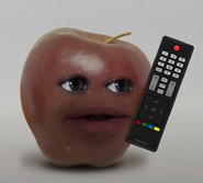 Midget Apple with a TV remote.