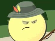 Grapefruit wearing a fisherman's hat