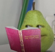 Pear reading a dictionary.