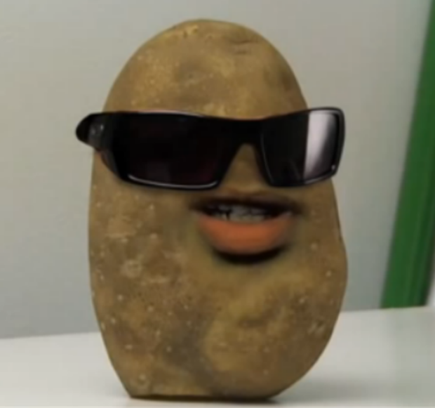 Premium Photo | A potato with sunglasses and a pair of sunglasses sits on a  table.