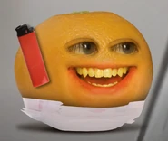 Baby Orange with a lighter.
