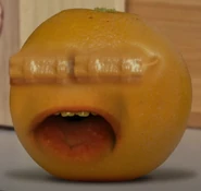 Orange with TNT stuck in his eyes.