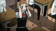 Kubodera's blood sprays on a horrified Aya.