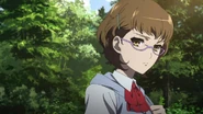Takako scowls.