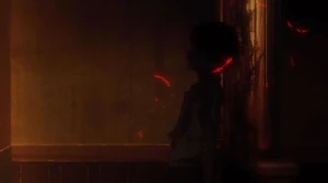 Makoto's dead body after the explosion burnt him.