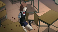 Yumi slides out of her desk as blood splatters all around her.