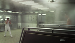 Bonzzo and Ender about to fight in the shower room.