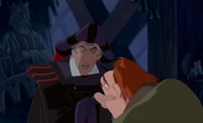 Frollo fragt Quasimodo, ob Steine reden können.