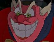 The Coachman's M. Bison-esque scary grin.