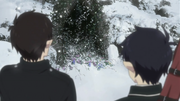 Rin y Yukio ante la tumba de Yuri