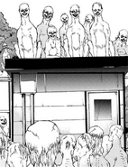 Dog-like zombies trap Maeda and Iwakura in a shed