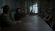 Лидер «Спасителей» (в центре) и его лейтенанты