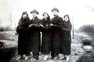 Kristal and his wife in a group shot along with friends in Łódź after WW2