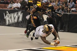 Terrence Campbell making a diving play against the Los Angeles KISS.