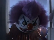 Crimson Clown closes in on him to get rid of him for being so bad!