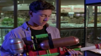 Ross arms himself with a water gun