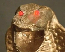 The snake staff is enchanted with evil magic!