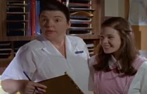 Nurse Hantin introduces Amanda to the new volunteer