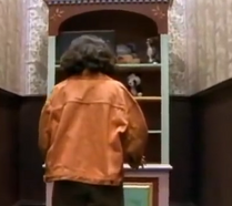 She finds out the the door to Dollhouse's attic is blocked by a bookcase