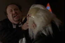 Carl screams repeatedly for help as he is grabbed by Dreyfus