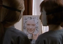 Then #87 shows Emma her face in the book, and reveals her name is Lizzie