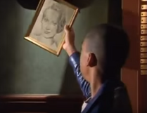 Quinn finds the portrait he needs on the wall nearby