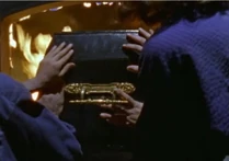 They push the coffin into the incinerator