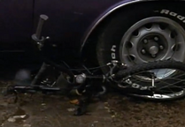 The babysitter's boyfriend's car comes in running over David's bike :(