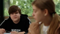 The chubby boy introduces himself to her as Graham