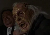 Hearing this Dreyfus lets Carl go and makes a run for the vial