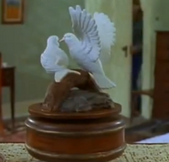 Marjorie's prized possession is a Doves statue music box