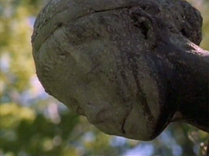 The Stone Maiden smiling.