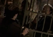 He locks the gate on them and runs away once again