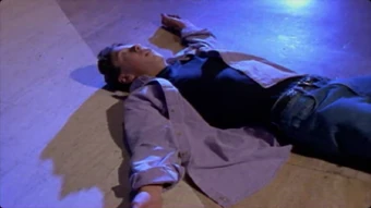 Ross lies on the ground